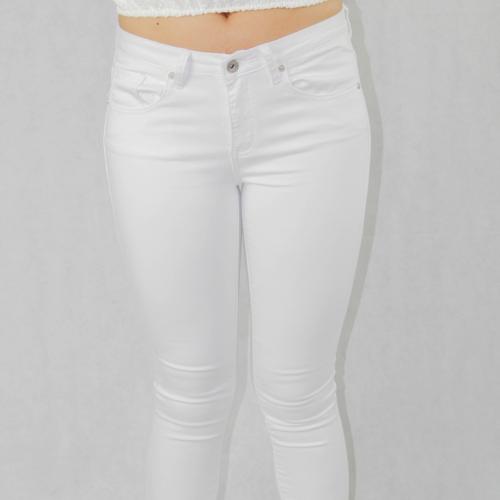 White Mid Rise 5 Pocket Skinny Jeans